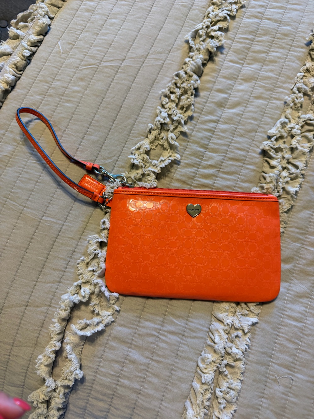 Coach Glossy Orange Patent Wristlet Clutch with Heart Plaque